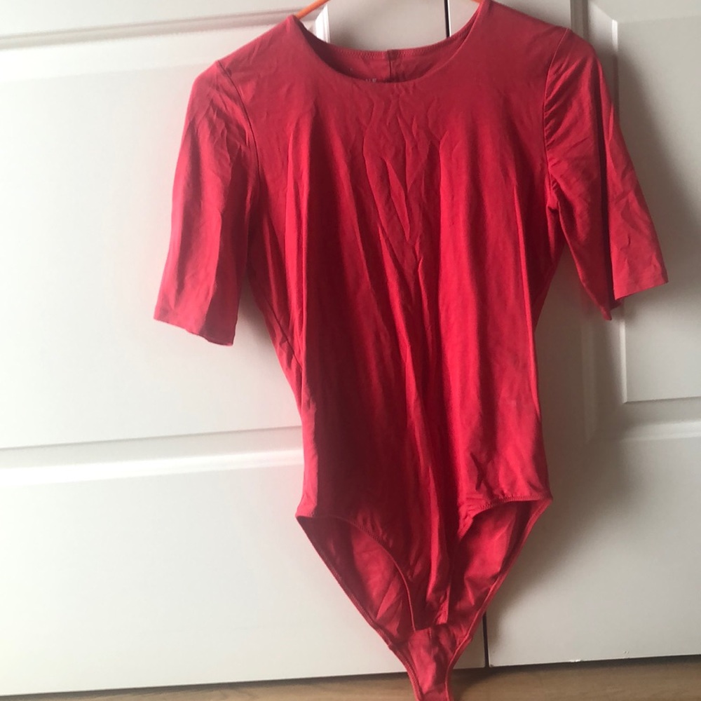 Red Everlane bodysuit